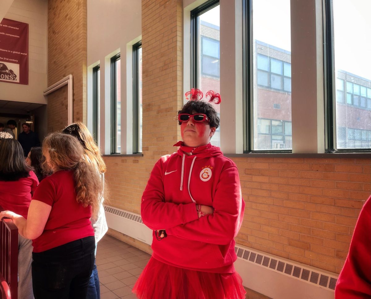 Sophomore Arda Turan looks positively spirited in his red get-up!