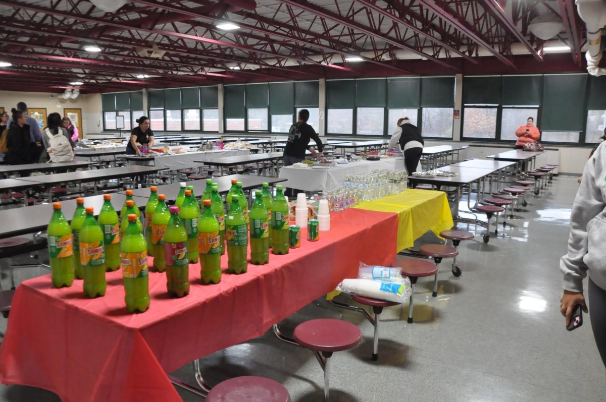 The Portuguese Club sets up the tables before festivities start. 